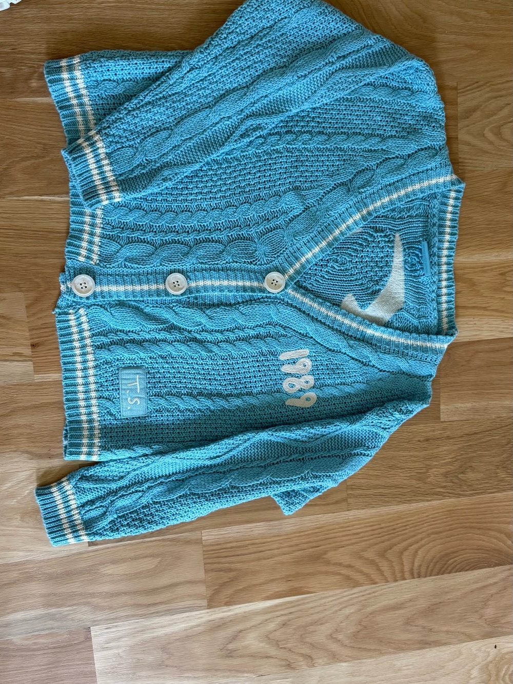 Taylor Swift Turquoise Cable-Knit 1989 V-Neck Cardigan with Striped Trim - Picture 2 of 3